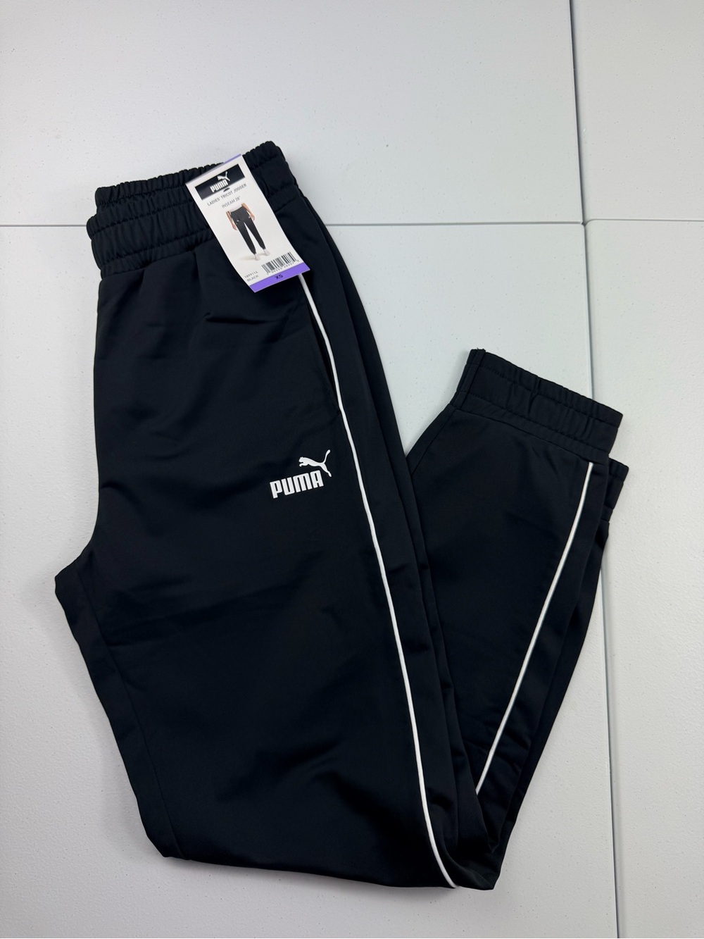 Puma women’s Black Track joggers new XS
